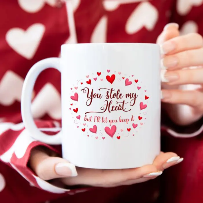 You stole my heart but I’ll let you keep it mug with romantic heart illustration design